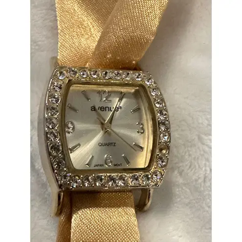 Avenue Gold Tone Crystal Rhinestone Bezel Quartz Watch Snap Band Women