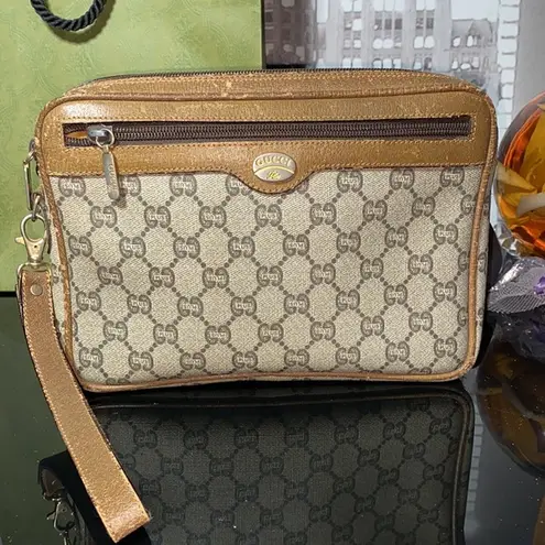 Gucci Authentic  GG Plus Clutch Bag