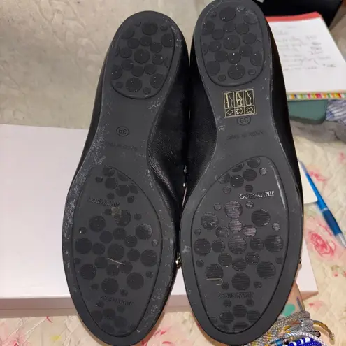 Jimmy Choo Black and Gold Flats with Studded Elegance