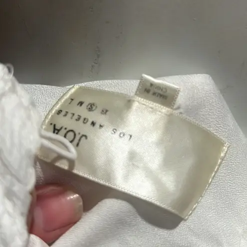 J.O.A. white lace open back romper