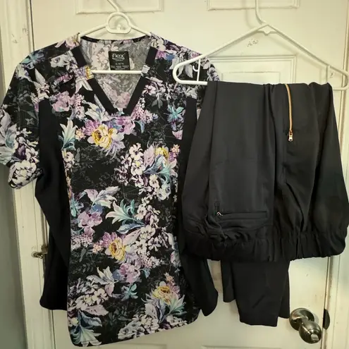 Elle Scrubs size XL  top black white yellow flowers & HeartSoul bottoms in black