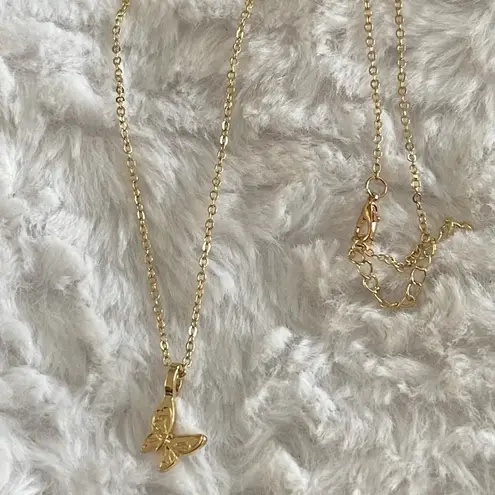Dainty gold tone butterfly necklace