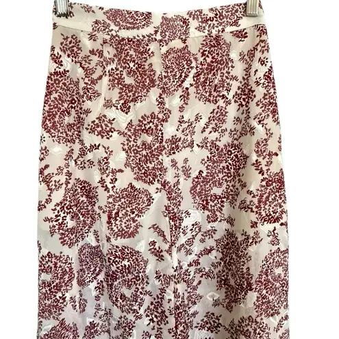 Elliatt high waisted/wide leg brocade floral flowy pants. Size XS.