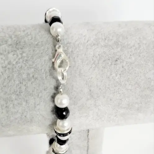 Hand Crafted Black and White Beaded with Unicorn Skeleton Charm Bracelet