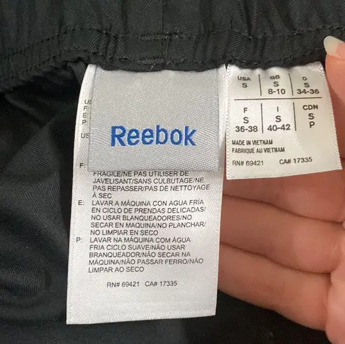 Reebok  black Athletic capris with contrast navy inserts size S