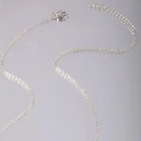 Glow in the dark lotus necklace