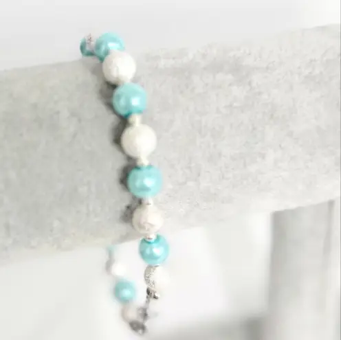 Hand Crafted Ice Blue and Sparkly Silver beaded Snowflake Charm Bracelet