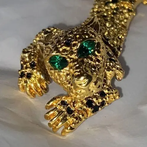 Vintage Articulated Leopard Pin Gold with Green Glass Eyes
