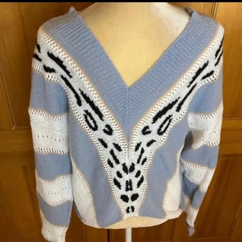 Lavishly Paris NWT, Leopard Designer Drop Shoulder Sweater.