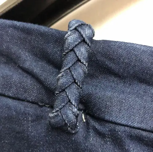 NYDJ Size 10 knee length, jean skirt with stretch ,pockets, and patches