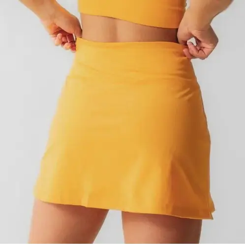 Girlfriend Collective  Sport Skort in Golden GlowSz L