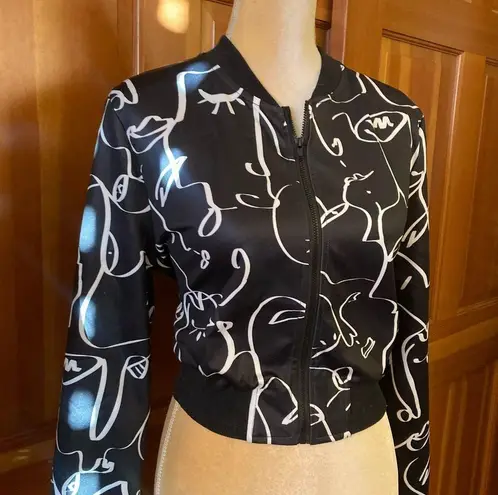 NWT, Lavishly Paris Women’s Designer Graphics Zip Up. Black