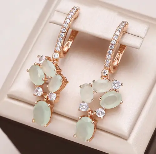 Exquisite light sage green cubic zirconia rose gold dangle earrings NIB