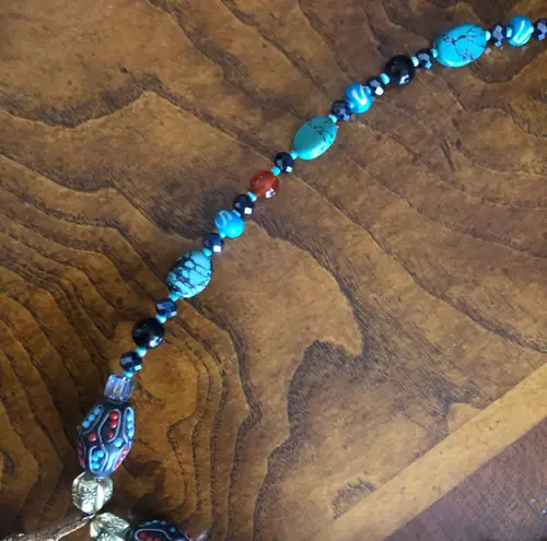 Handcrafted southwest style natural stone leather fringe medallion necklace