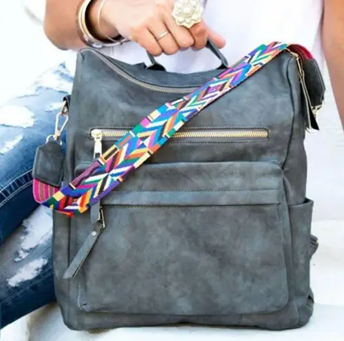 GRAY VERSATILE BACKPACK STYLE BAG
