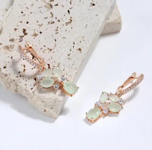 Exquisite light sage green cubic zirconia rose gold dangle earrings NIB