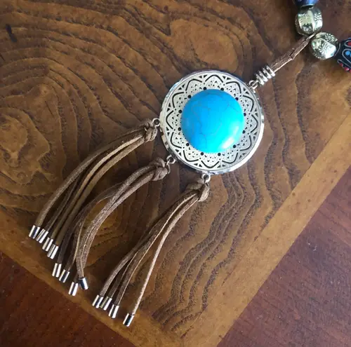 Handcrafted southwest style natural stone leather fringe medallion necklace
