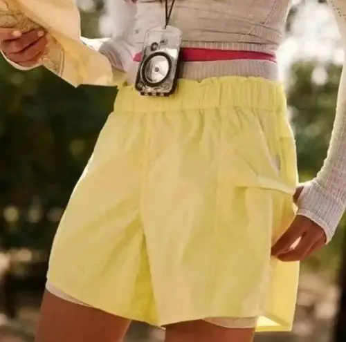 Free People Movement In the Wild Shorts in Glow Yellow