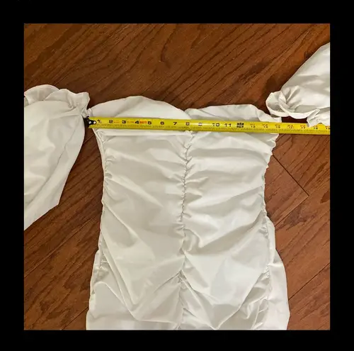 White dress with attached short Puffy sleeves