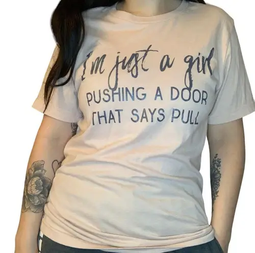 None i’m just a girl pushing a door that says pull size medium