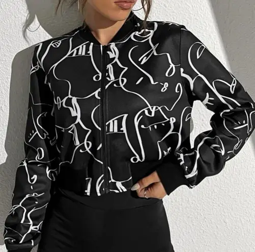 NWT, Lavishly Paris Women’s Designer Graphics Zip Up. Black