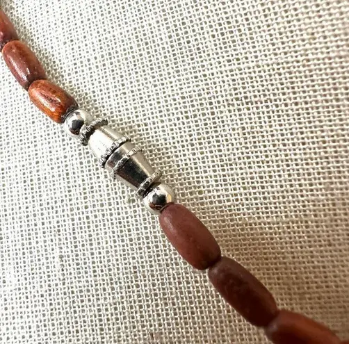 Wood beaded dolphin pendant necklace Brown