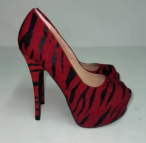 Liliana  Tiger Print peep toe platform stiletto heels, size 8 D17