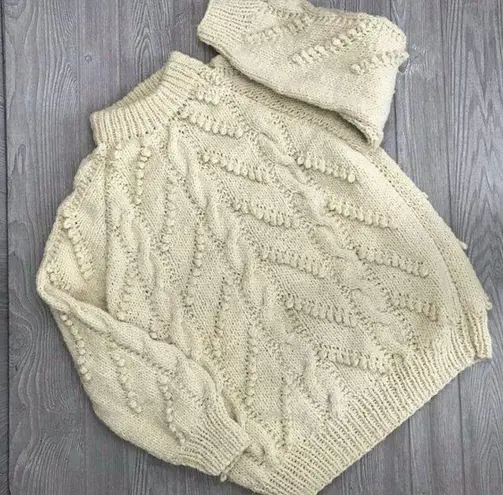 Handmade crochet cotton knitted sweater with pom poms and braids oversized