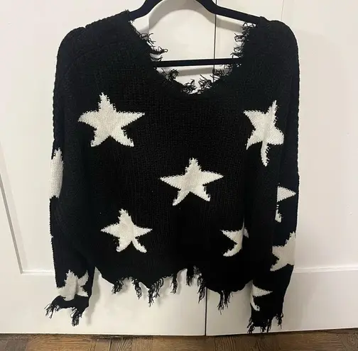 Polly & Esther Black distressed star sweater