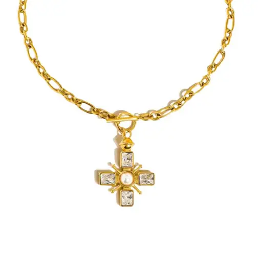 Chunky gold cross necklace with pearl and toggle clasp