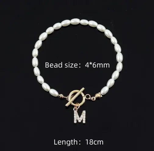 Initial āIā Gold And Pearl Bracelet