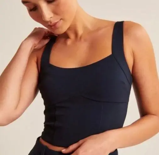 Abercrombie & Fitch Stylish navy tank top. Features adjustable straps. Perfect for casual wear.  Top is ticketed as medium but runs like an XL thumbnail 1