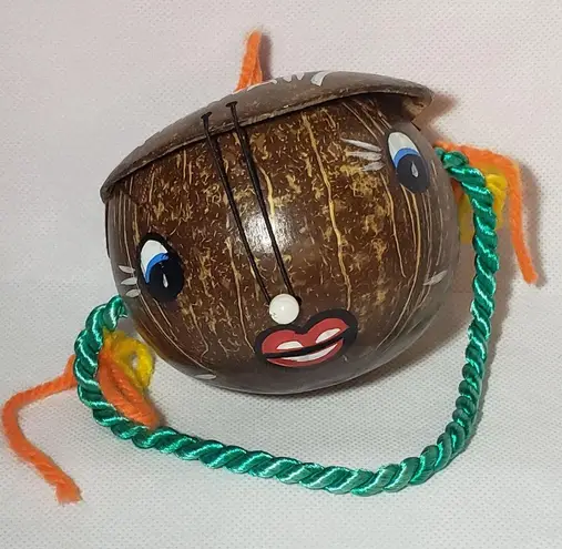 Coconut souvenir purse with painted face pearly bead nose & yarn handle Green