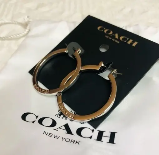 Coach  hoop earrings silver color​​​​