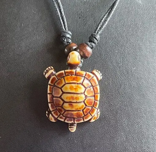 Adjustable black rope turtle necklace