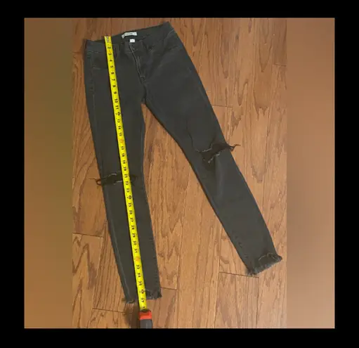 Refuge  black rugged mid rise jeans - size 2. gently warn and excellent condition for rugged jeans. Holes in kneecap areas only & ankles. Measurements approximately 13” waste x 9” rise x 37” long. Non smoking home. priced to sell at as is condition. Don’t like my price, make reasonable offer! And thank you for checking my closet.