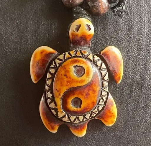 Yin Yang sea turtle necklace