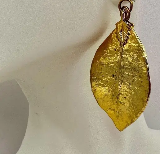 Gold tone leaf post earrings
