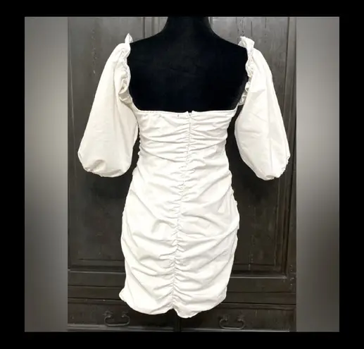White dress with attached short Puffy sleeves