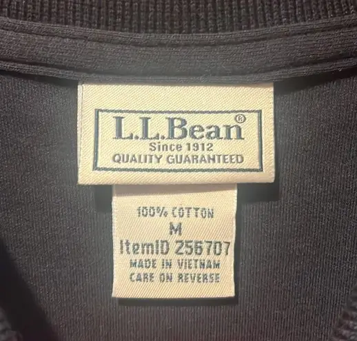 L.L.Bean women’s black short sleeve polo shirt size medium.