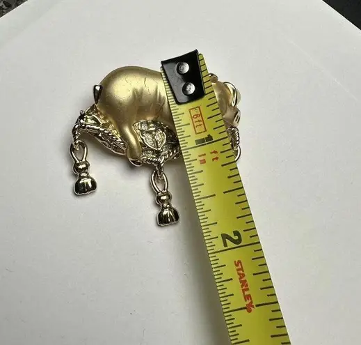 Signed AJC Gold Tone Pig On Tasseled Pillow Brooch Pin