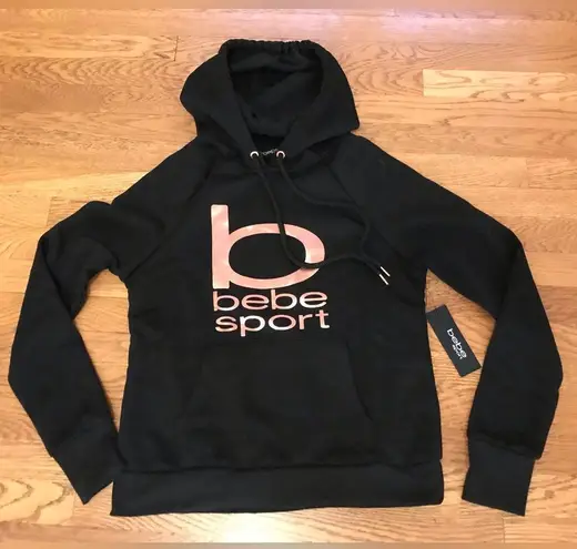 Bebe hooded sweatshirt in black/rose gold size M