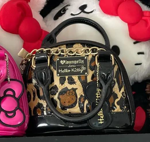 Lounge Fly mini hello kitty x dome purse