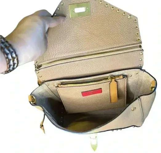 Valentino Garavani Vitello Rockstud Hype Shoulder Bag.