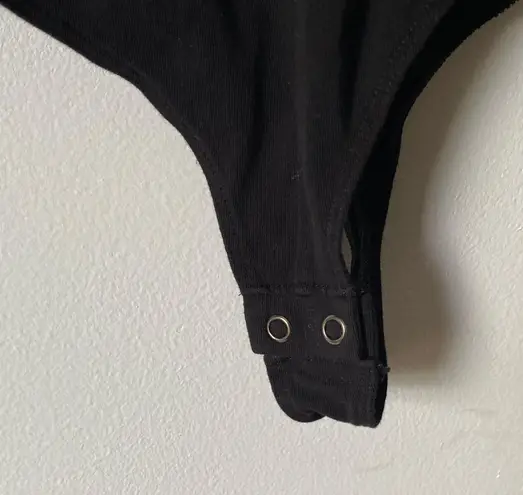 NWOT black deep v neck bodysuit