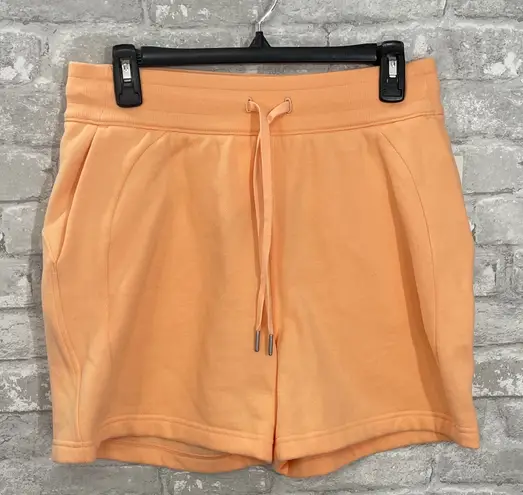 Lululemon  Scuba High-Rise Short 5"
Peach Bellini