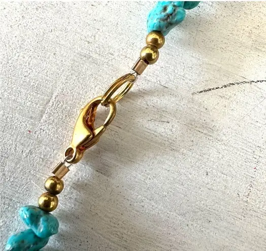 Brass elephant pendant necklace with carnelian, turquoise and red jasper beads