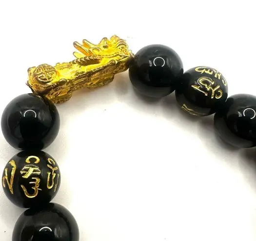Gold tone dragon Feng shui lucky bracelet Black