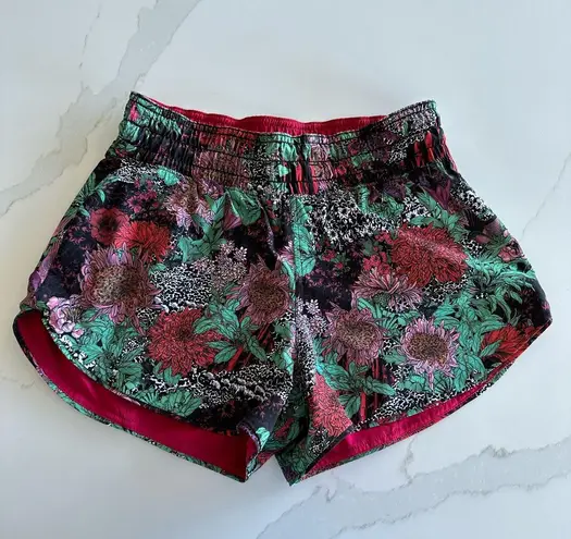 Lululemon reversible choose a side short in ruby red/zen garden multi