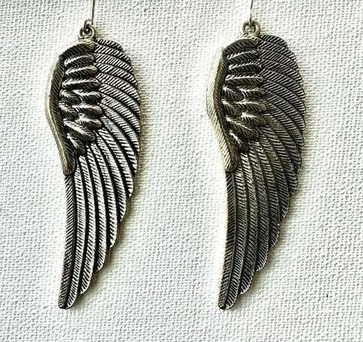 Silver tone angel wing earrings